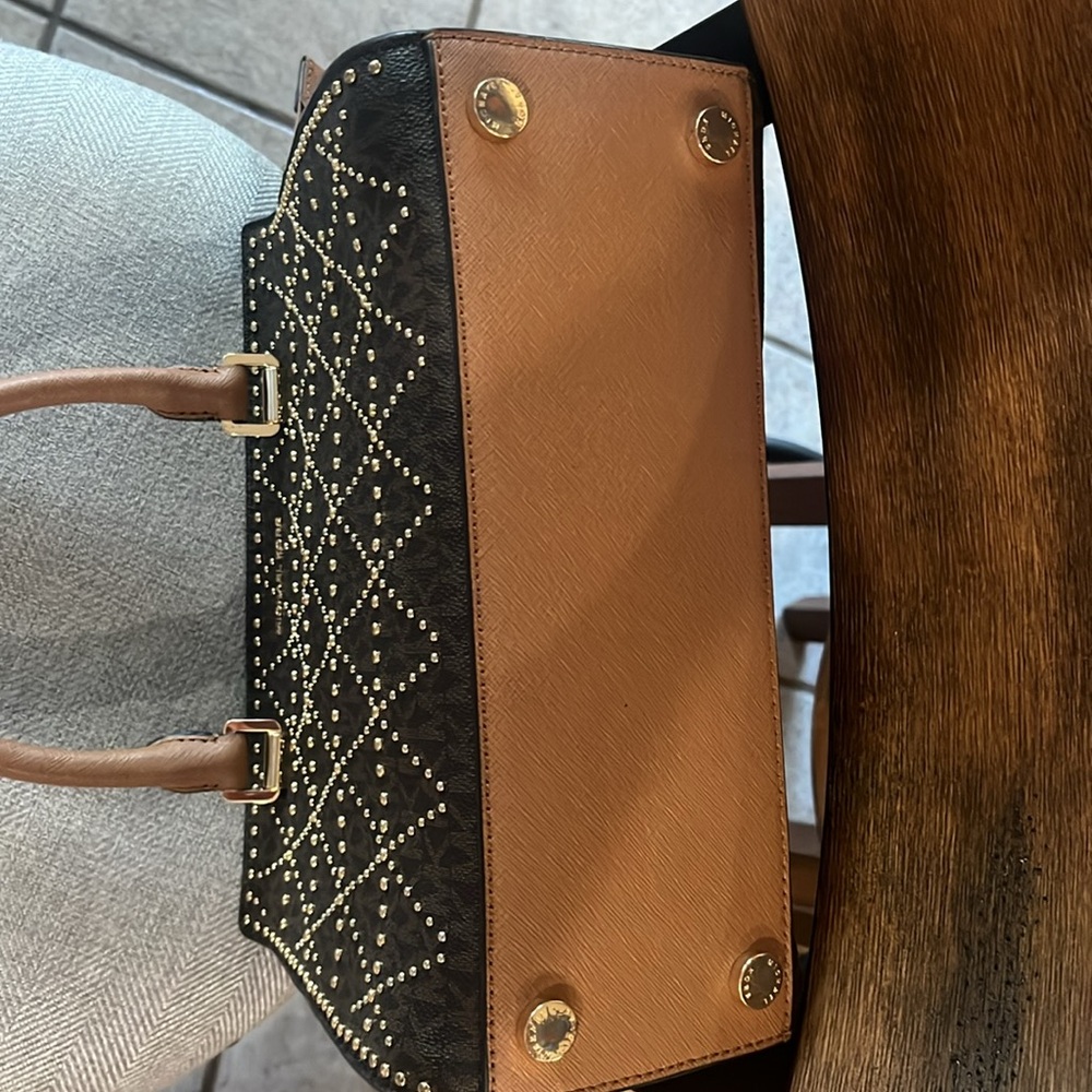Michael Kors Brown and Tan Studded Satchel
11’9 inside zipper and wristlet . - Picture 3 of 4